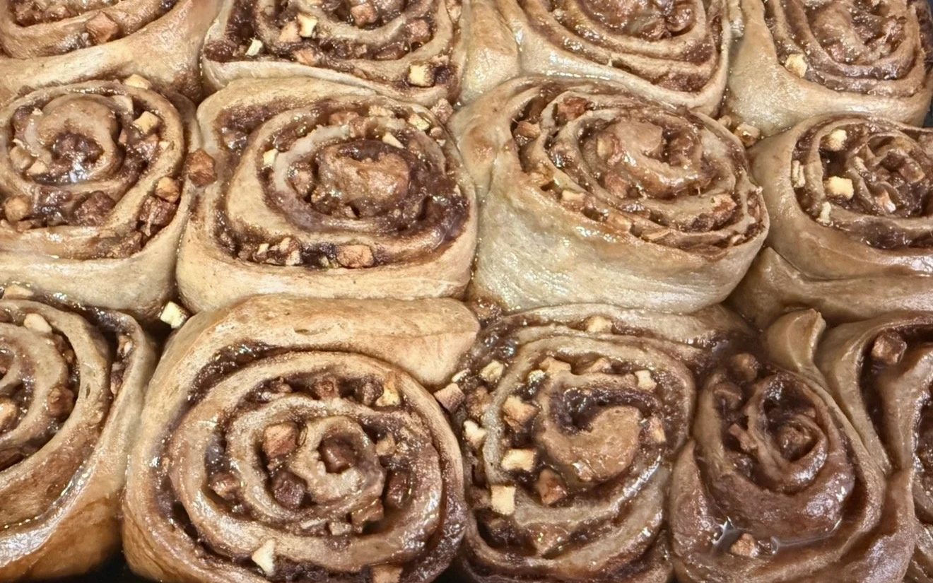 A tray of freshly baked cinnamon rolls